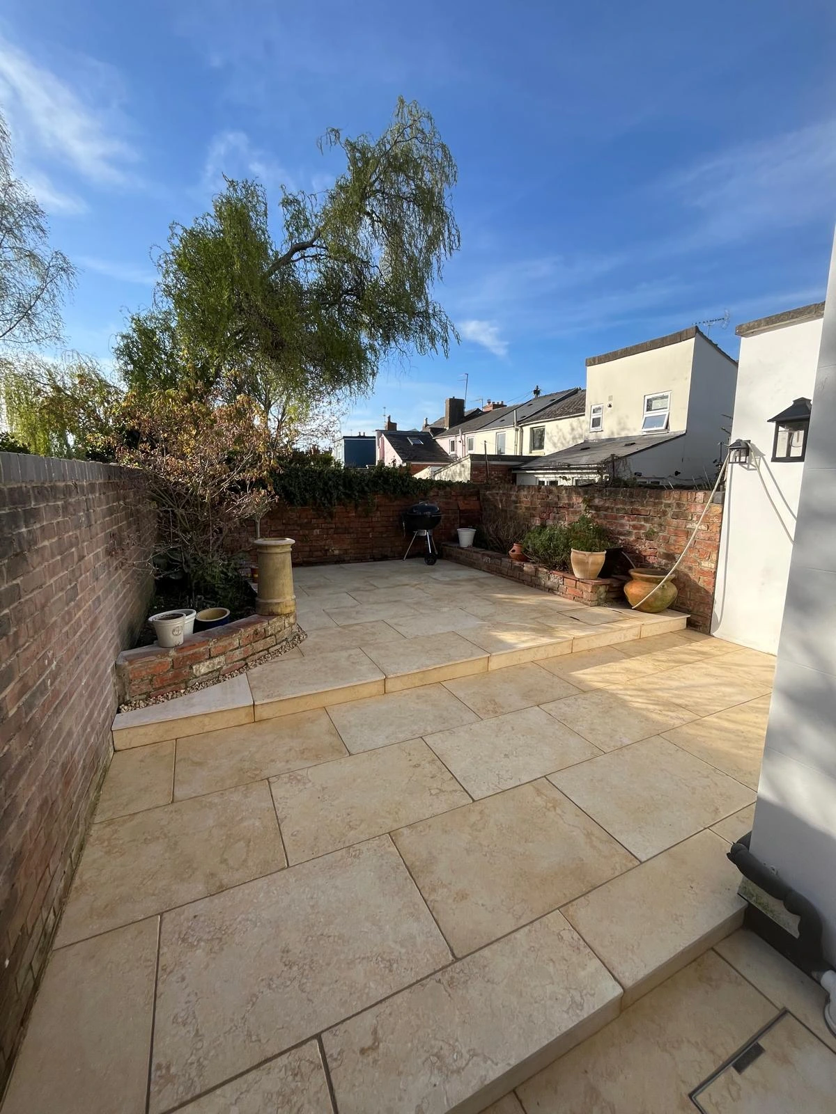 Lovely garden with a pond and gravel path
