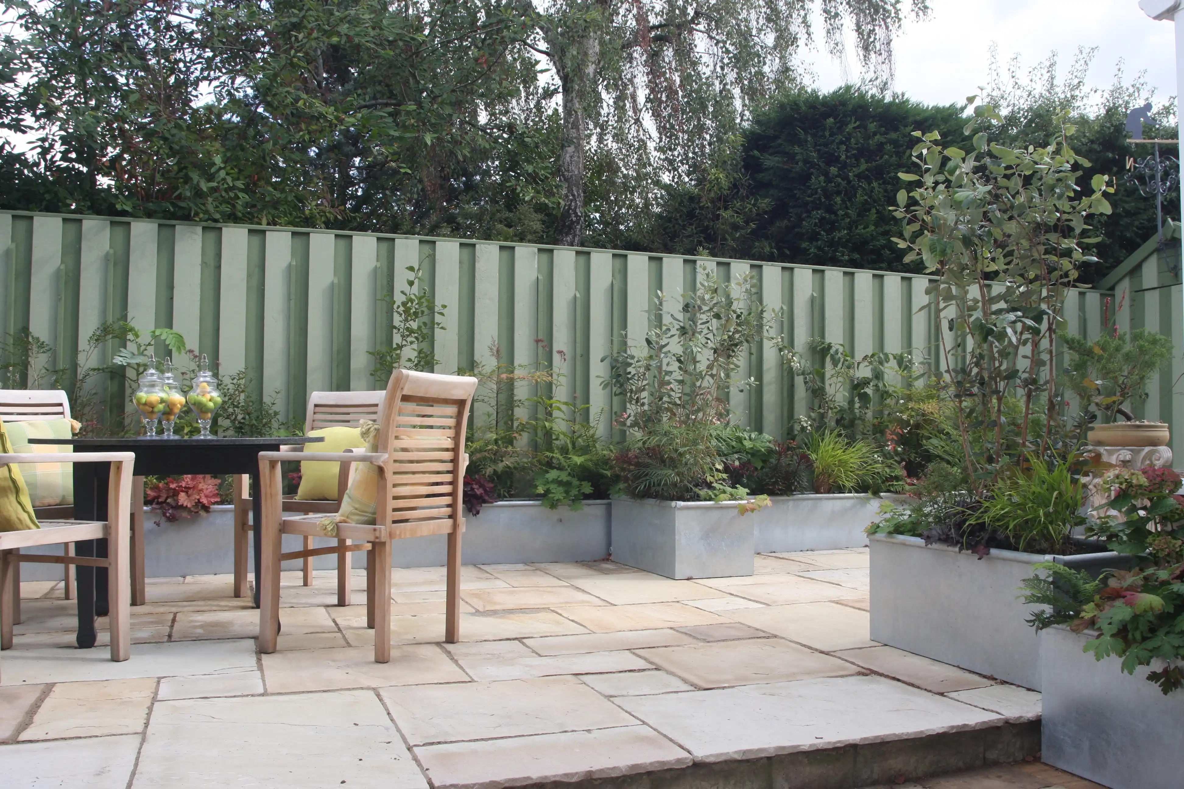 Lovely garden with a pond and gravel path