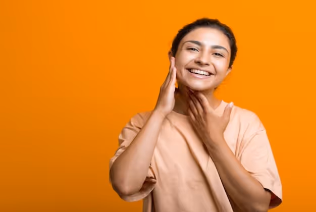 Happy woman with healthy, glowing skin