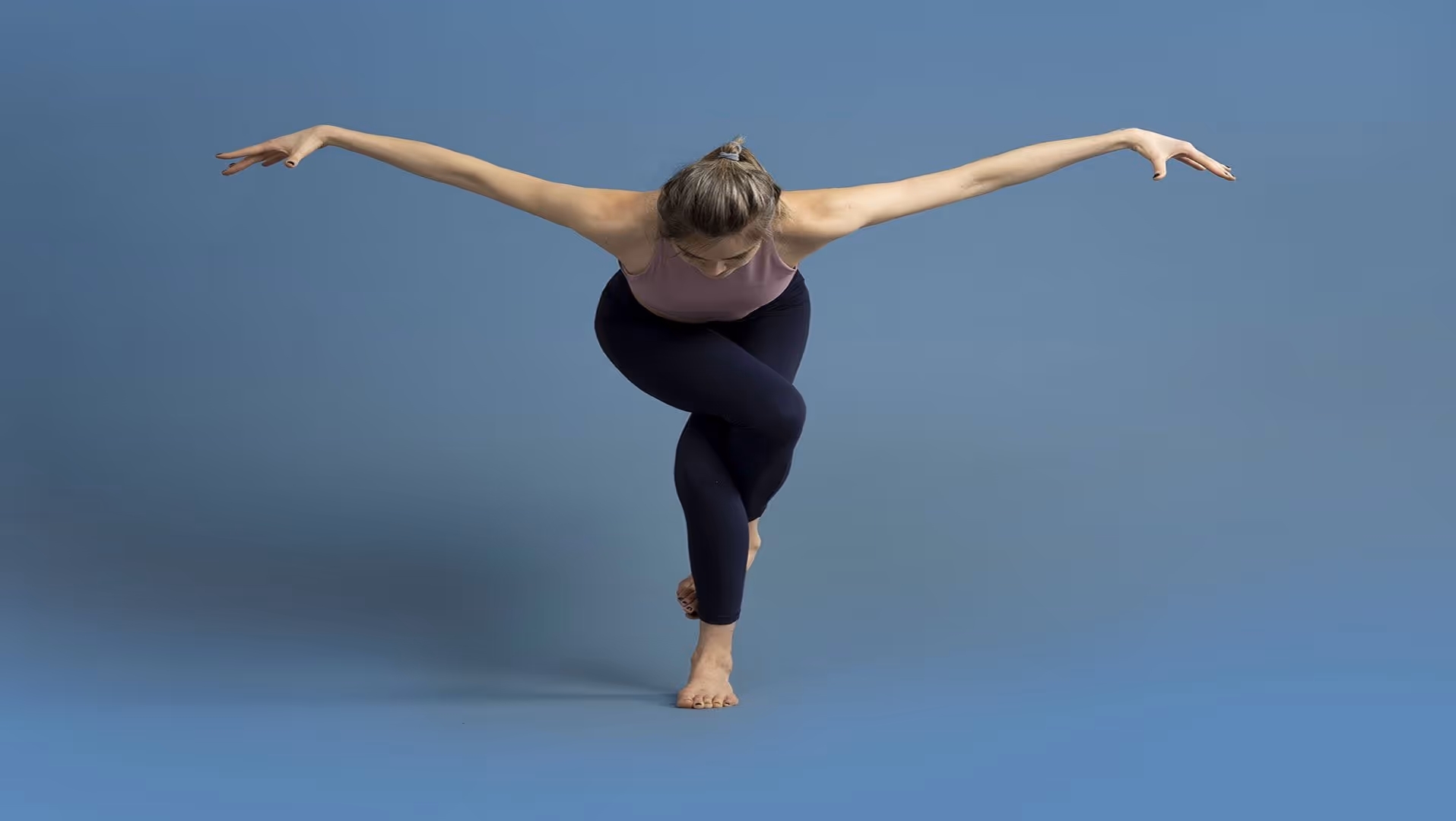 A yogi woman with an incredibly fit body