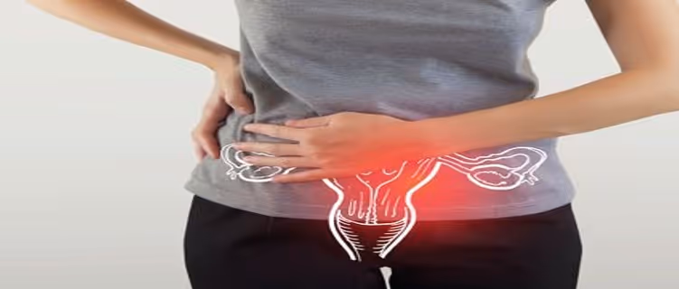 A woman places her hands on her stomach due to menstrual pain.