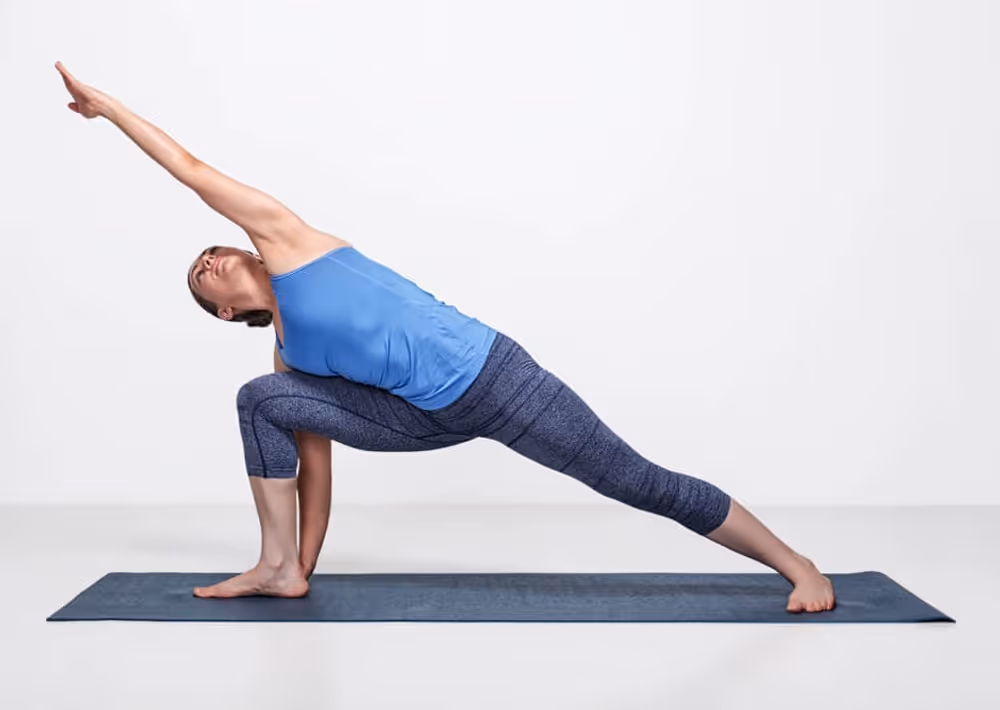 A woman doing yoga poses to understand hip anatomy