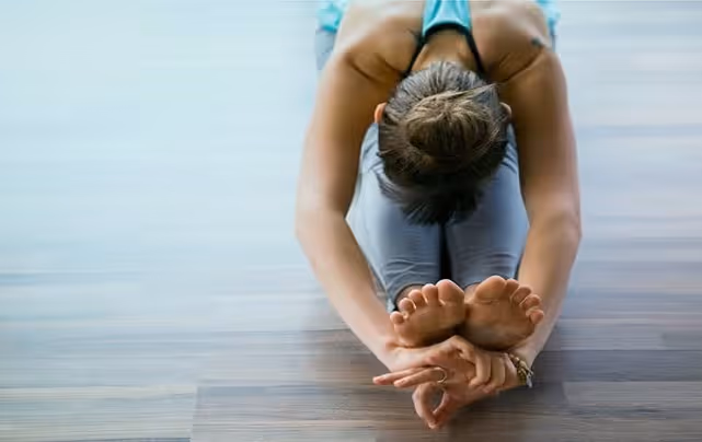 Yogi woman practicing flexibility