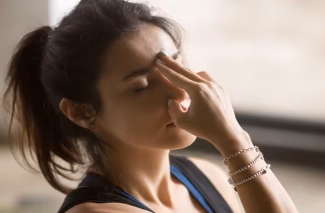 Yogi lady doing Ojai breathing