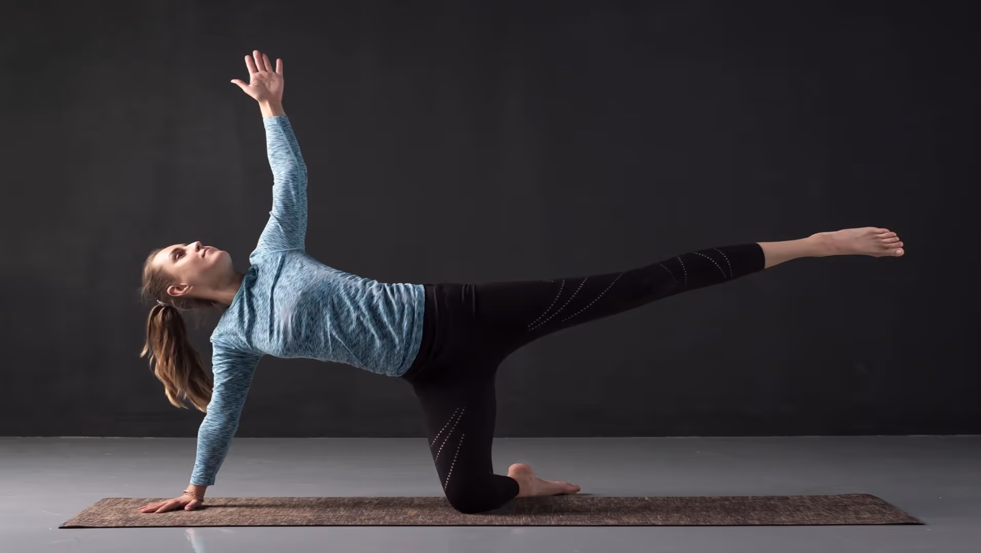 Yogi lady doing asana on mat