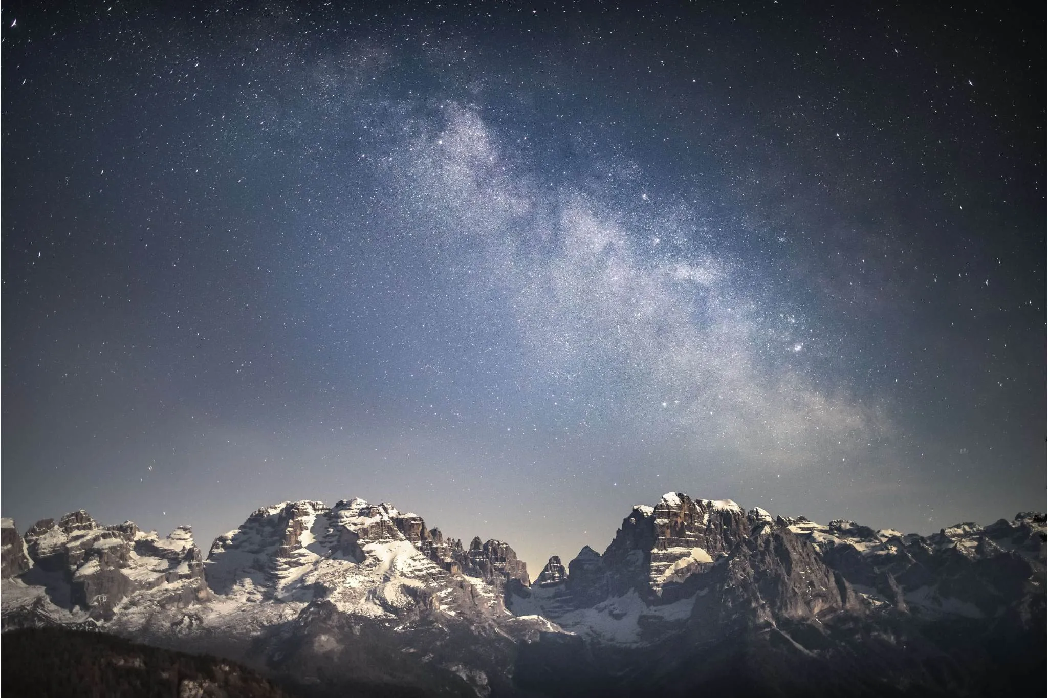 Mountain rocks in front of starry sky