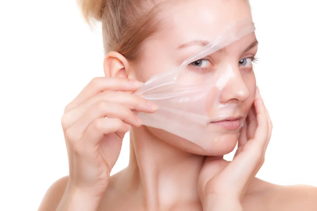 girl removing mask