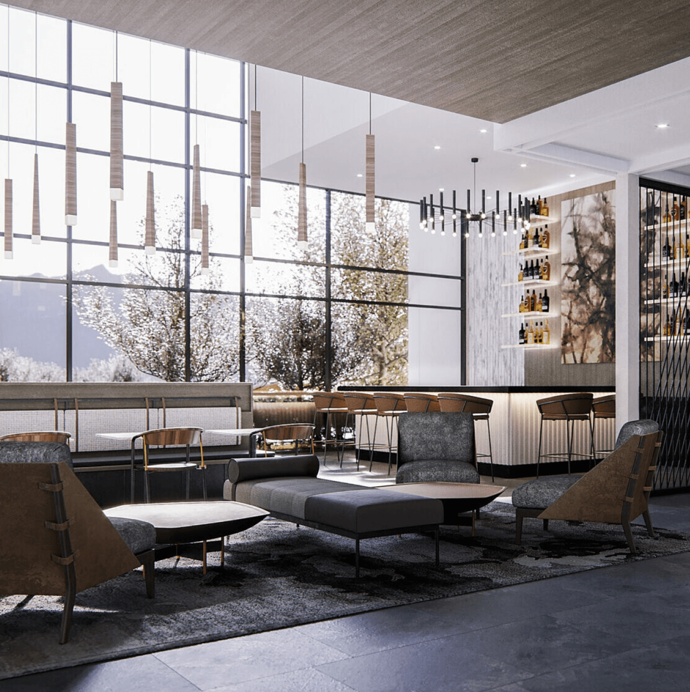 Modern lounge with large floor-to-ceiling windows showing trees outside, featuring a seating area with gray and brown chairs, a central cushioned bench, pendant lights hanging from the ceiling, and a well-lit bar with stools and shelves of bottles.