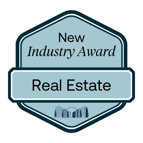 Blue badge reading 'New Industry Award Real Estate' with small building icons at the bottom.