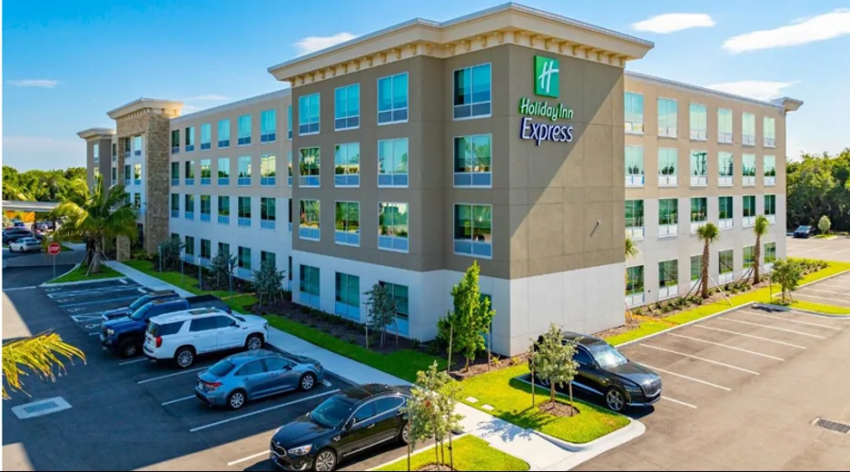 Holiday Inn Express hotel exterior across from Port Canaveral in Cape Canaveral, Florida