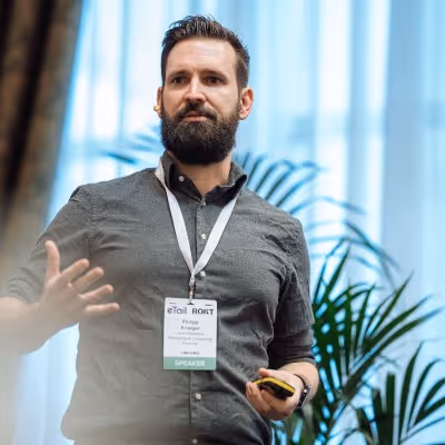 A picture of Philipp Krueger standing and doing a talk