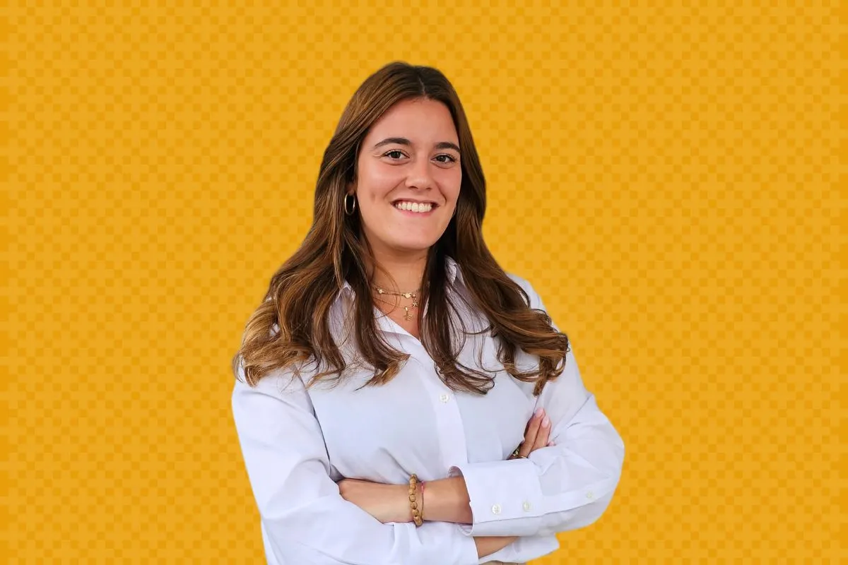 young woman professional against yellow background