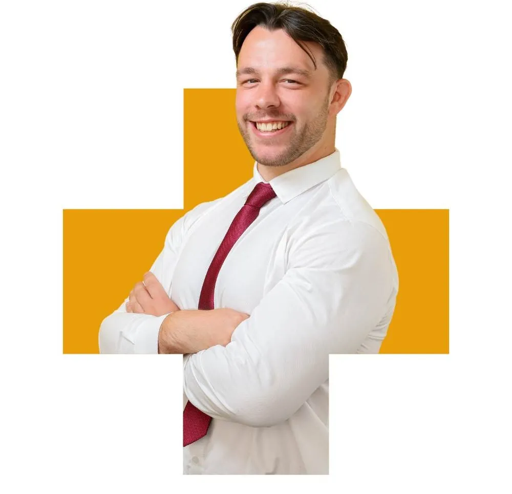 man in shirt and tie smiling in a plus shaped frame