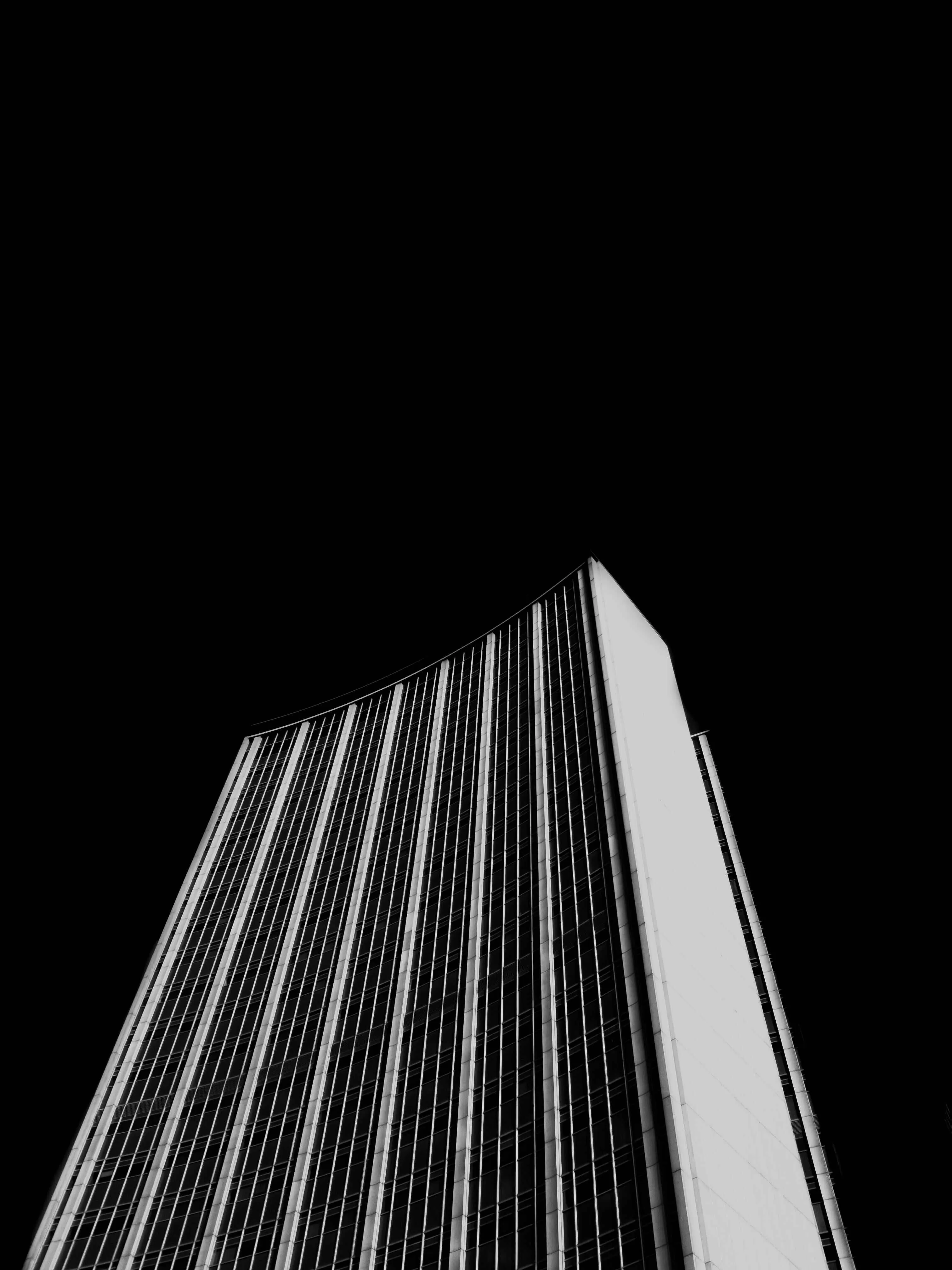 corporate building against black background