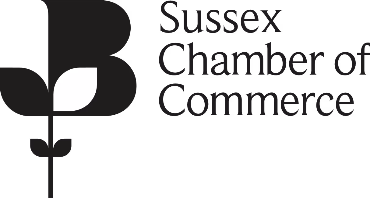Logo of the Sussex Chamber of Commerce featuring a stylized letter "B" with a leaf design.