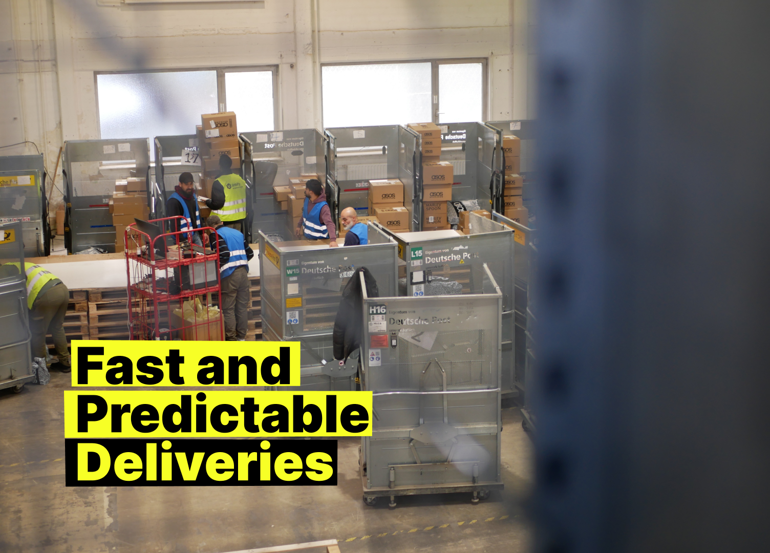 Urbify team sorting parcels in a warehouse with roll containers, overlaid caption reading 'Fast and Predictable Deliveries'.