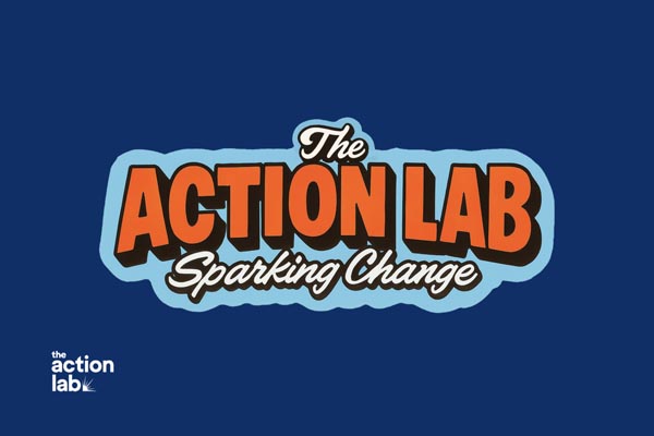 Retro-style logo reading “The Action Lab Sparking Change” on a dark blue background