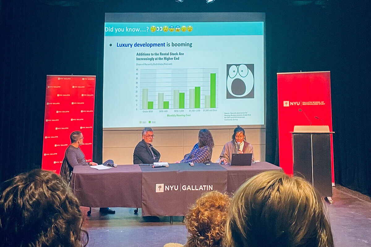 Panel discussion at NYU Gallatin featuring four speakers, with a presentation background.