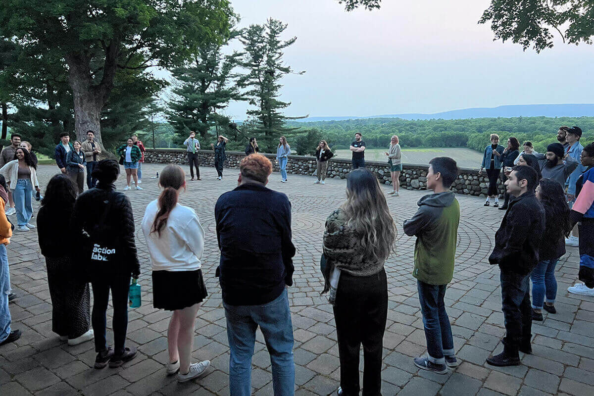 Group playing games around tables at a gathering.