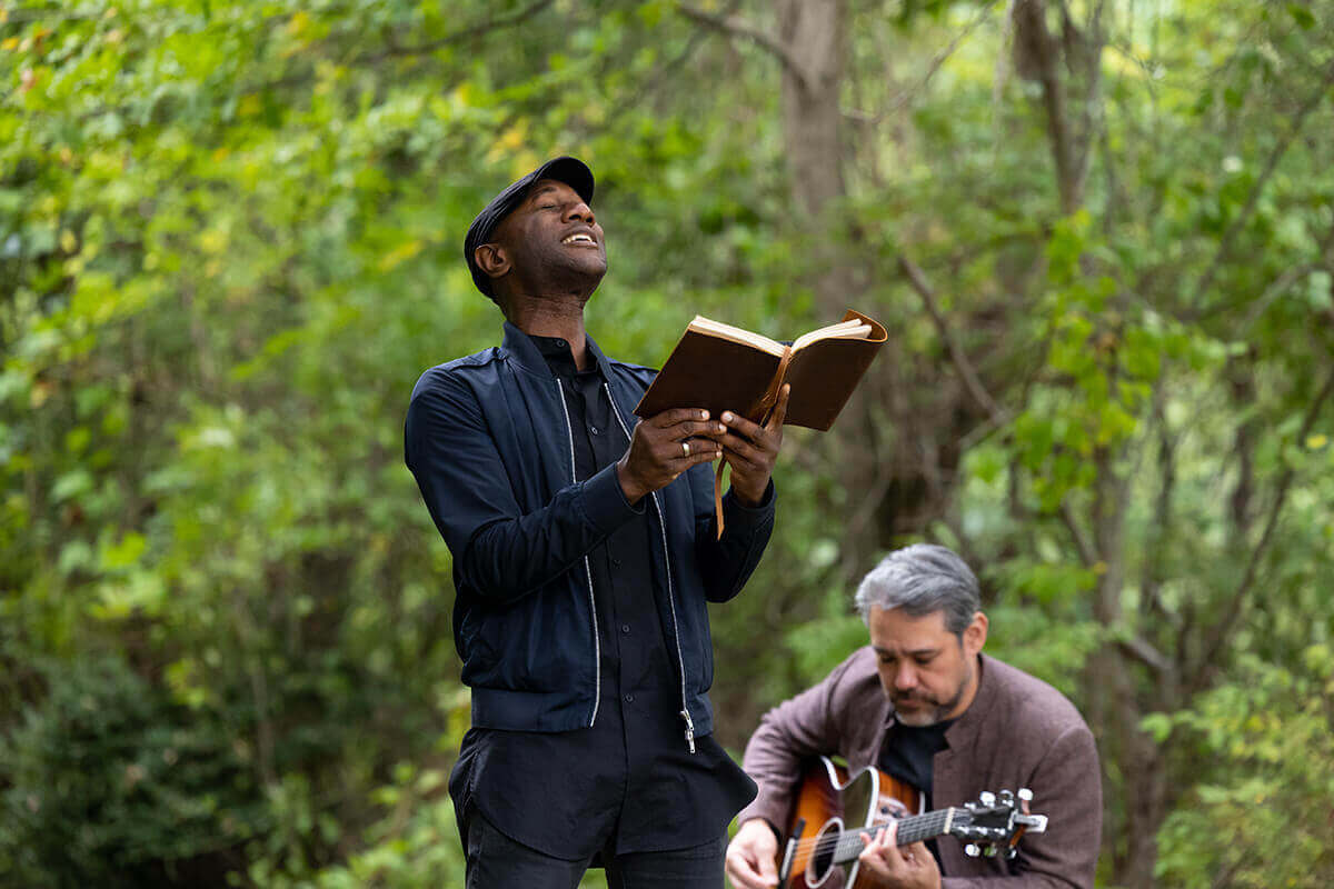 Person engaged in discussion during a group conversation.