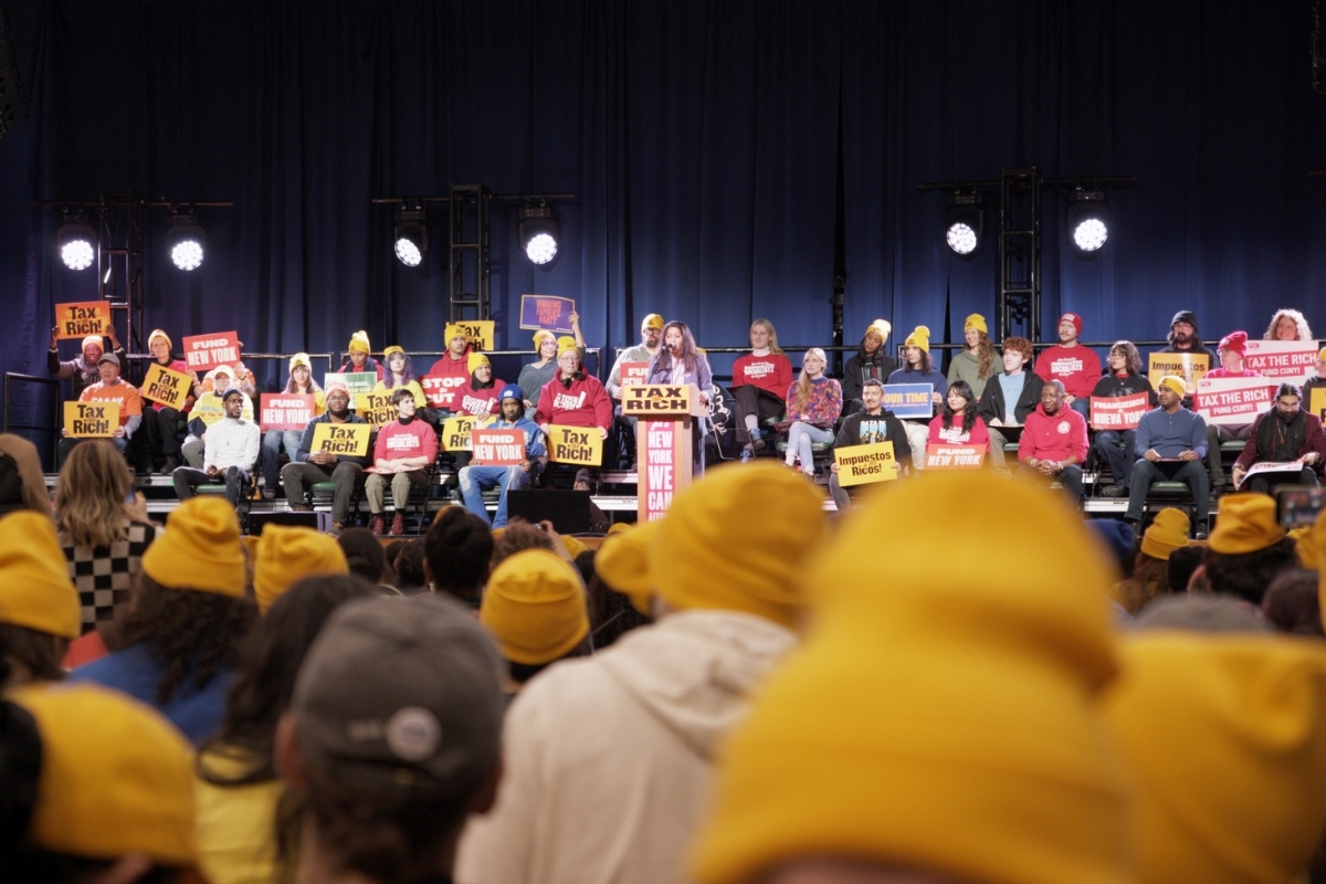Parents, childcare providers, and community leaders rallying in Utica, New York to demand investment in the childcare workforce.