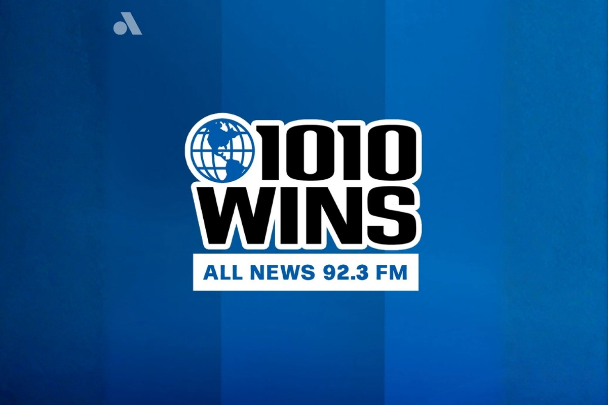 1010 WINS All News 92.3 FM logo representing real-time local news coverage for New York City.