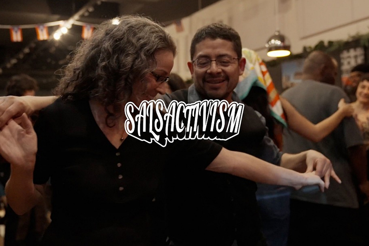 Community members dancing salsa and gathering for SALSACTIVISM at Sanger Hall, featuring live music, DJ sets, poetry, and activist speakers.