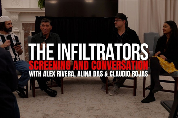 Audience and speakers during a screening and conversation event for The Infiltrators, featuring discussion on immigration and organizing.