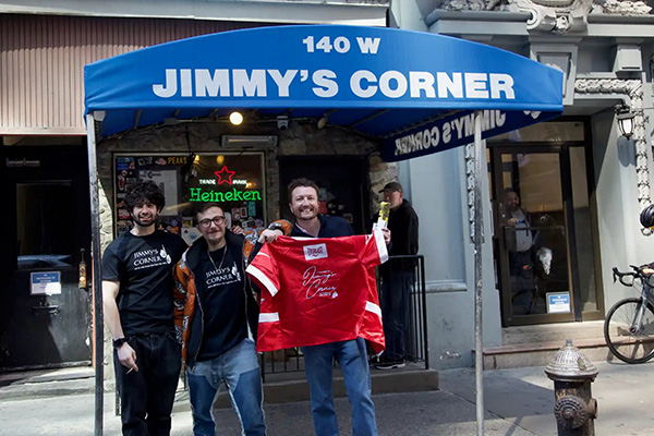 Supporters rallying to protect Jimmy’s Corner in Times Square, advocating for commercial rent stabilization to support small businesses.