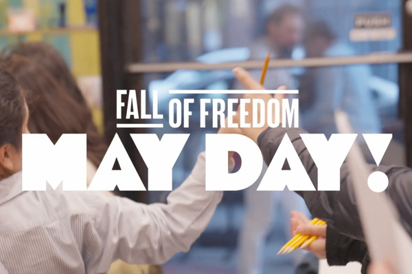 Promotional image reading “Fall of Freedom May Day!” over a photo of community members participating in an arts activity during May Day events in Williamsburg, Brooklyn.
