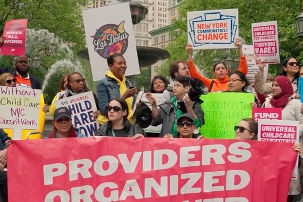 Child care providers, families, and advocates rally at City Hall Park in New York City during a Providers Organized for Power campaign calling for affordable child care and fair wages for Family Child Care providers.