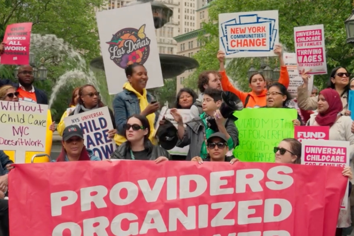 Child care providers, families, and advocates rally at City Hall Park in New York City during a Providers Organized for Power campaign calling for affordable child care and fair wages for Family Child Care providers.