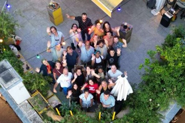 Delegation participants gathered on a rooftop in Istanbul, viewed from above.