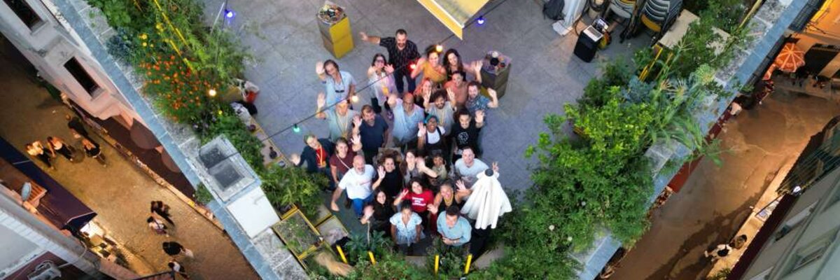 Delegation participants gathered on a rooftop in Istanbul, viewed from above.