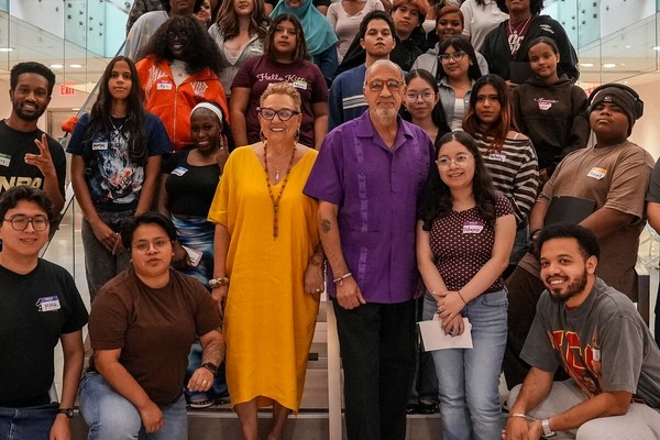 Youth Organizing Institute participants and mentors in a group photograph.