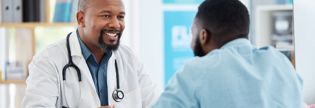 Male doctor talking to male patient