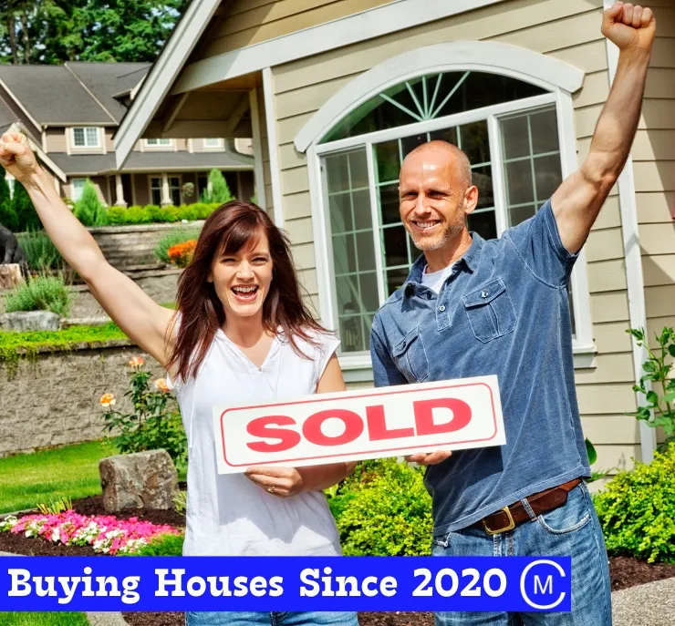 happy couples after selling house to we buy houses company