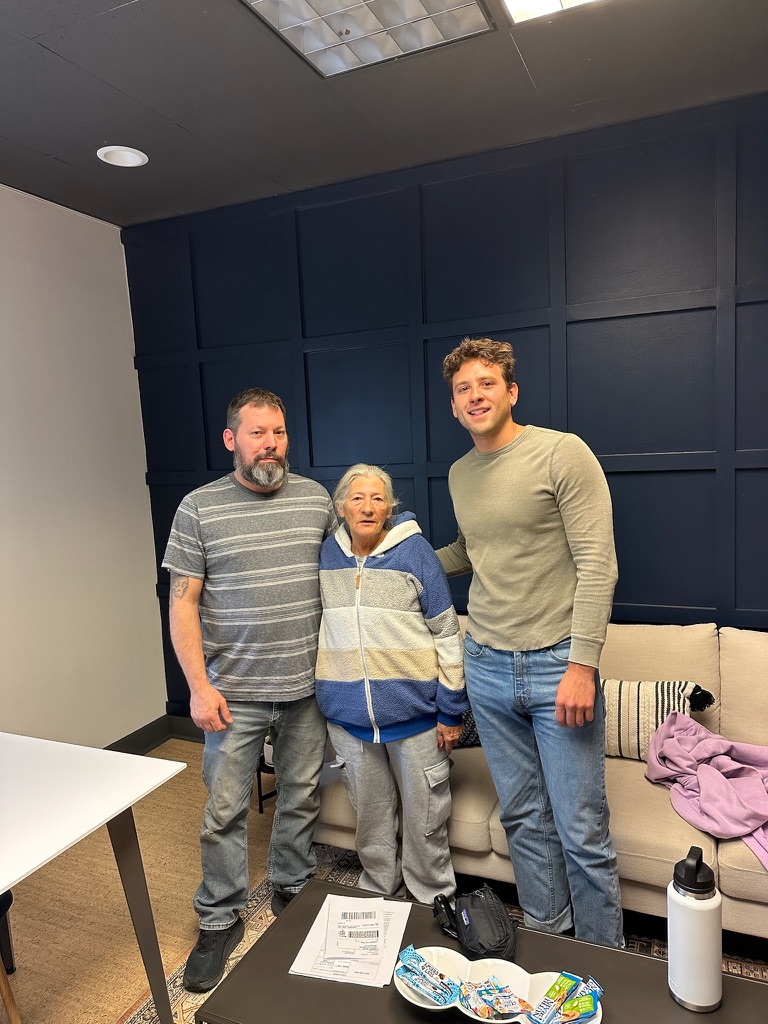 Andrew Manuel with sellers on closing day