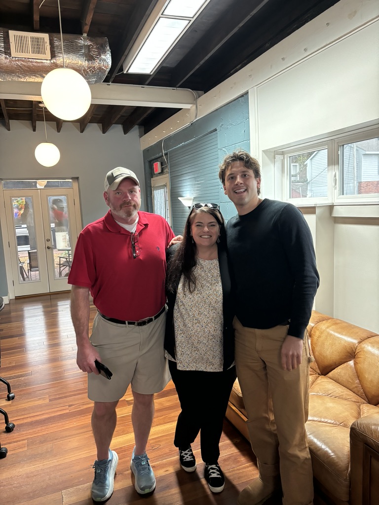 Andrew Manuel with sellers on closing day