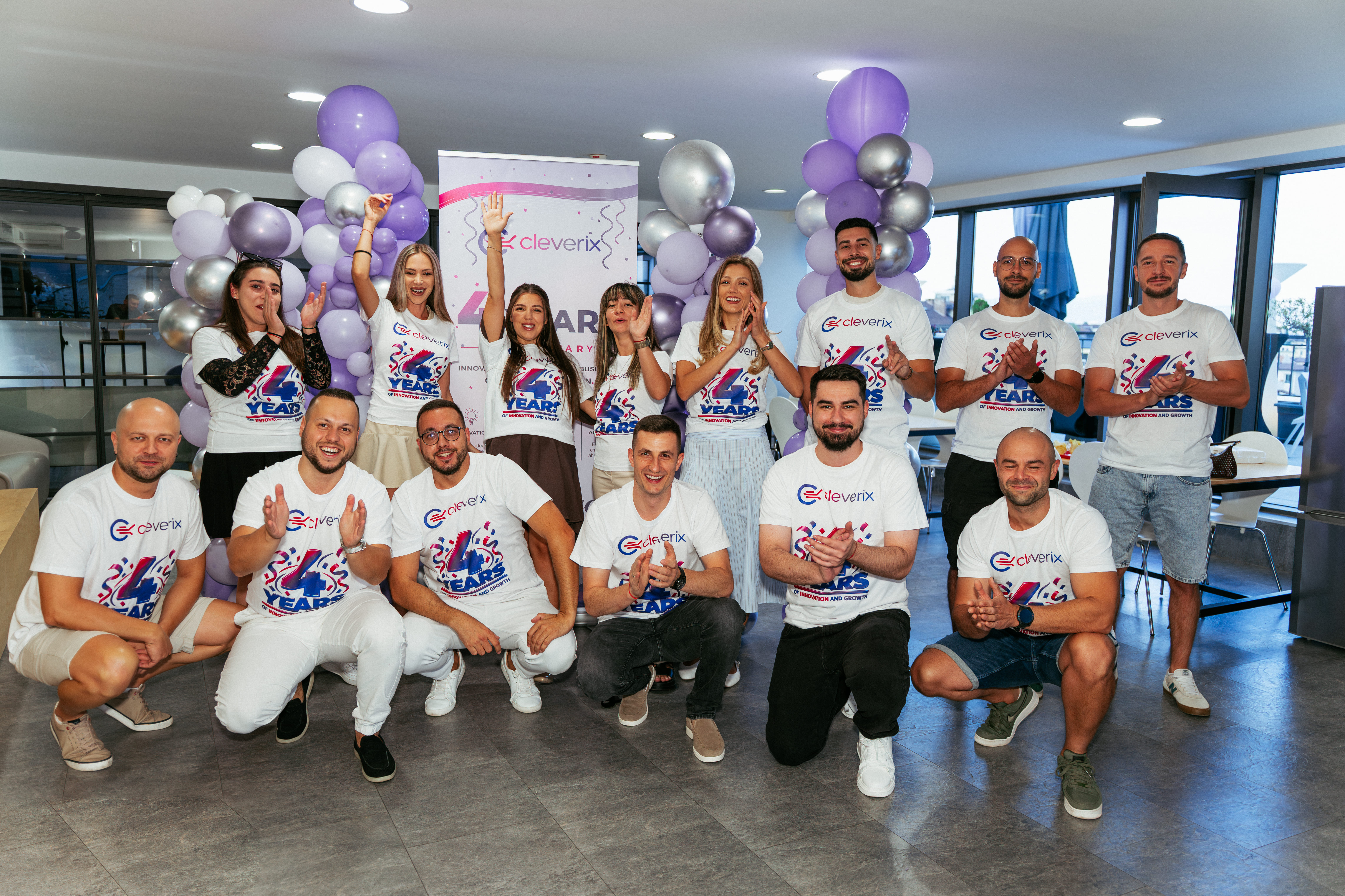 The Cleverix team in anniversary T-shirts at the four-year celebration