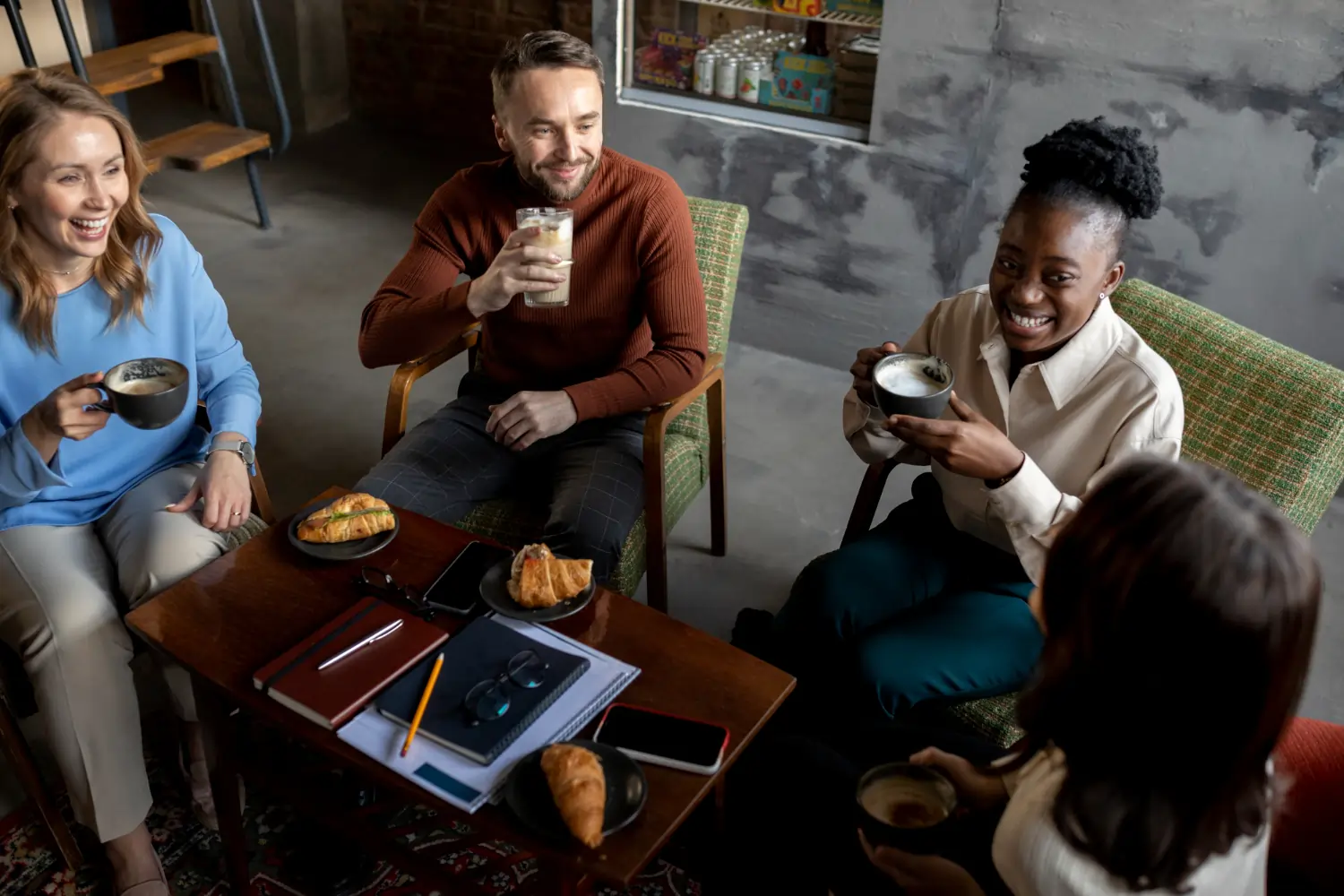Group of friends having coffee
