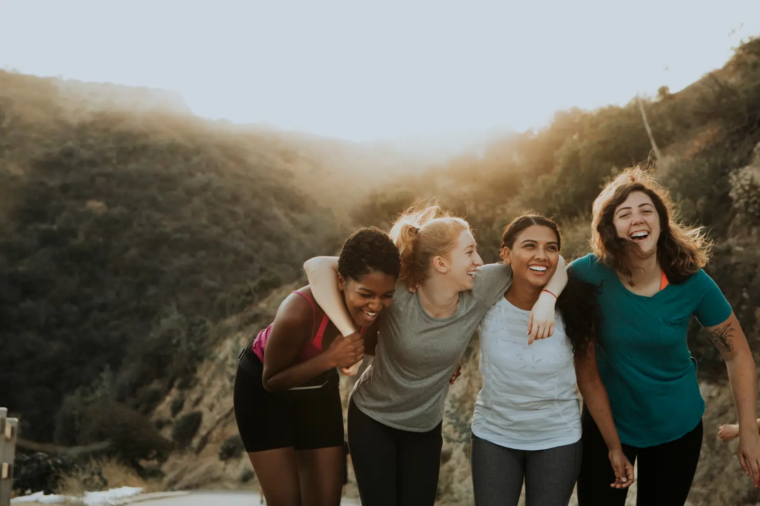 Friends celebrating after a workout
