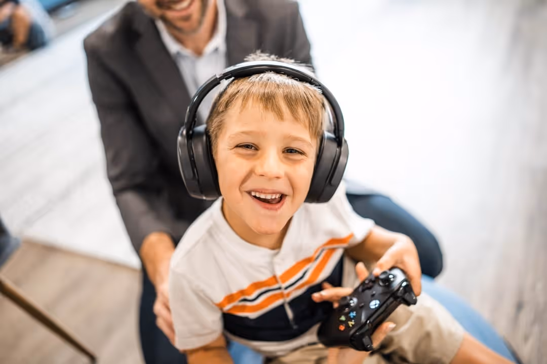 Dr. Kyle Daigle using laser therapy on a pediatric patient at NeuroSolution Center of Lake Charles, Louisiana.