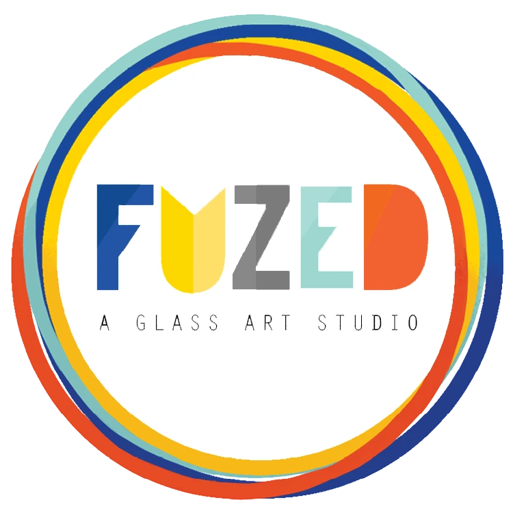 Colorful logo of FUZED, a Bay Area glass art studio, promoting creativity and team activities for all ages.