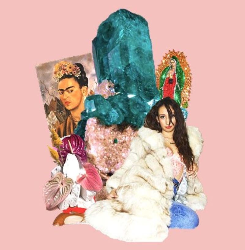 A woman in a white fur coat sits among crystals, spiritual items, and artwork on a pink background.