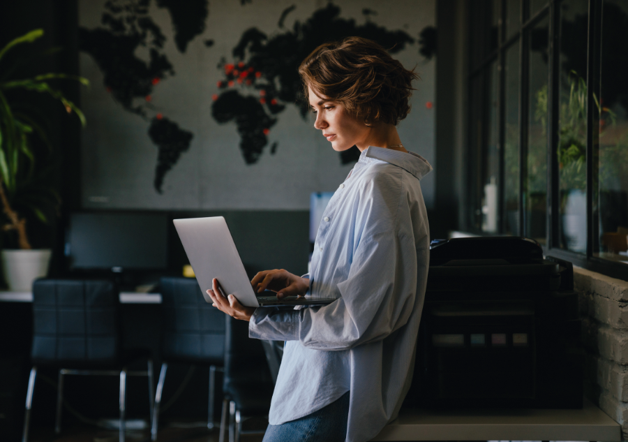 Person using a computer to connect. Collaborative & supportive environment