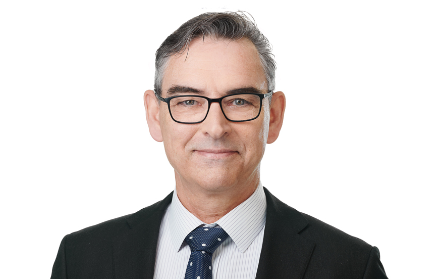 Headshot of Craig Andrews, Partner at McVeagh Fleming, professional style photo against a neutral background.