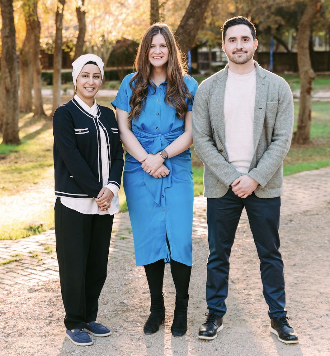 Dr. Alex, husband and 2 dogs on a boat