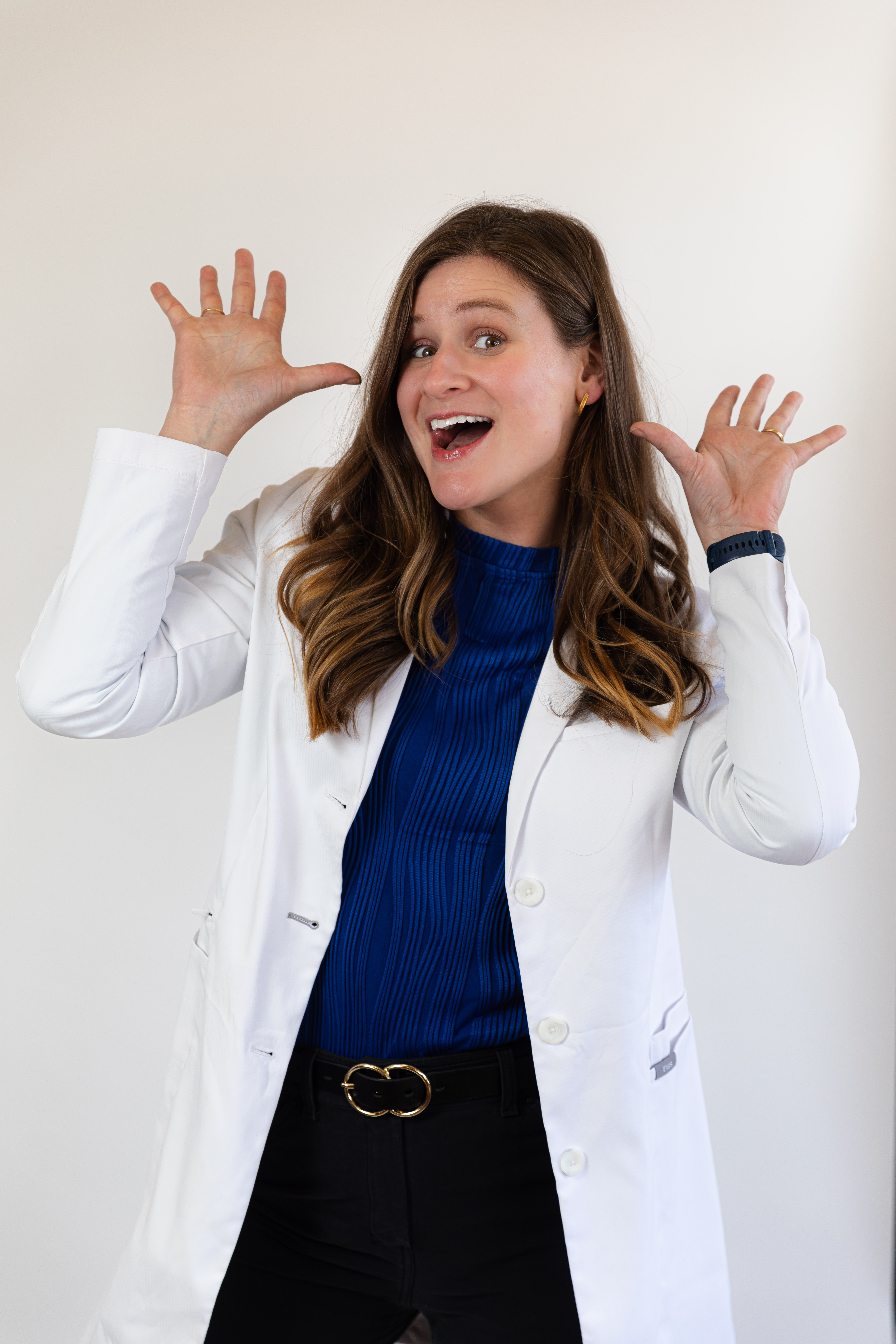 dr. alex, husband and dog sitting outside