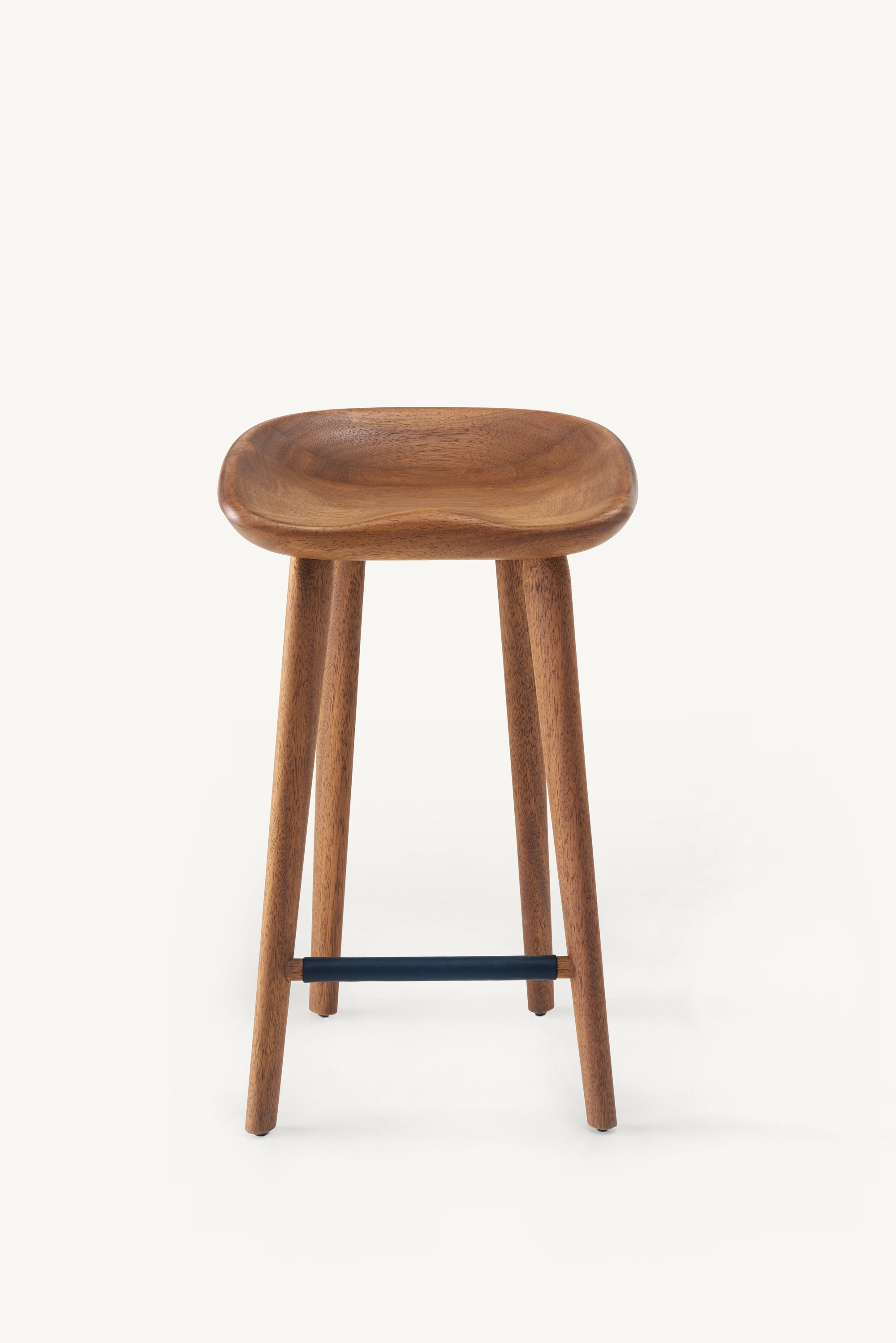 BassamFellows Tractor Counter Stool in carved solid iroko with a leather-wrapped footrest